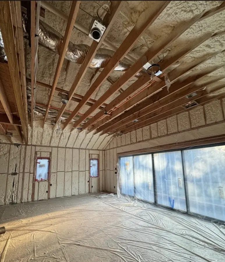 Interior walls and ceiling insulated with spray foam during new construction in Kirksville